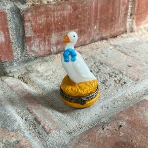 Vintage trinket holder mother goose and the Golden Egg